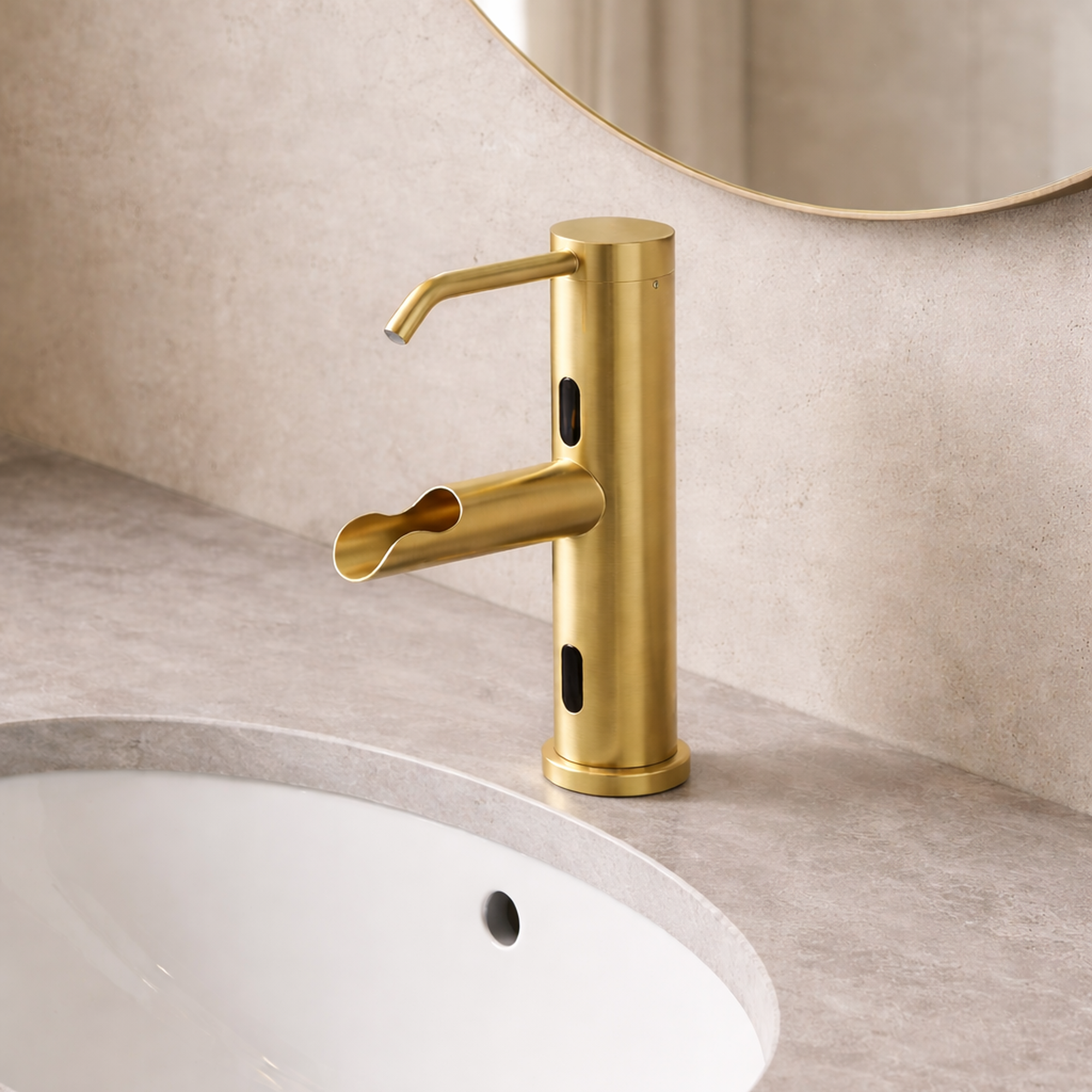 Gold manual faucet and wall-mounted automatic soap dispenser illustrating coordinated finishes